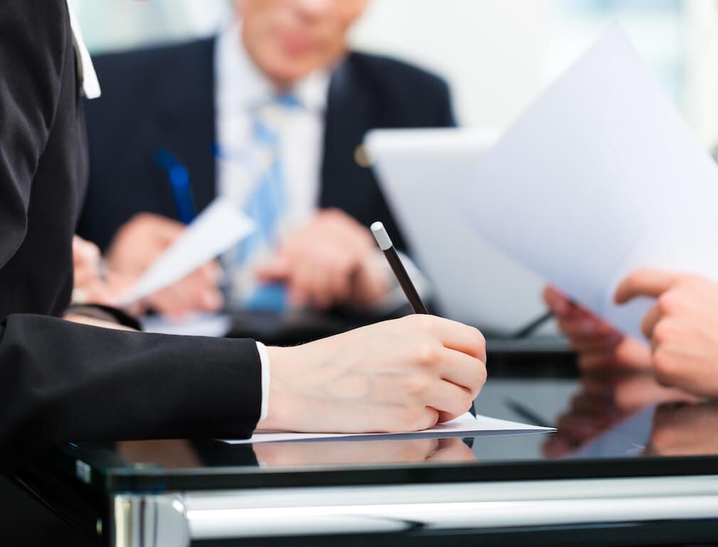 Higher education consultants reviewing strategy