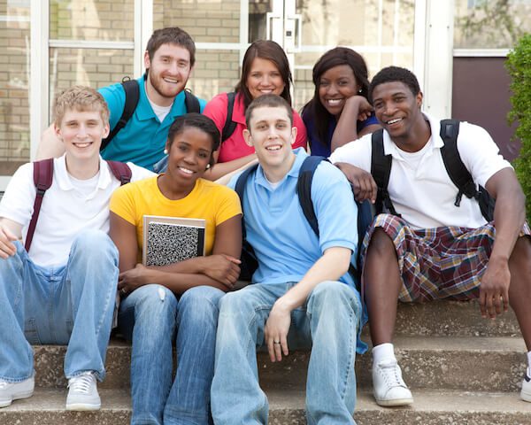 Students sitting on steps.